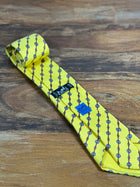Corbata Hermés amarilla
